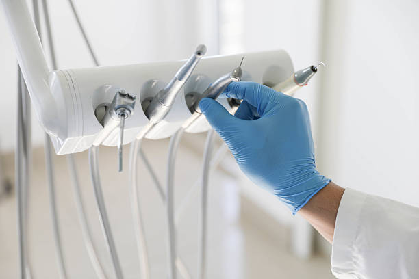 Professional Tooth Extraction technician working in Fayetteville, GA